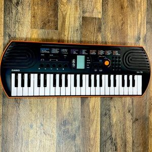 Casio SA-76 44 key mini keyboard in orange